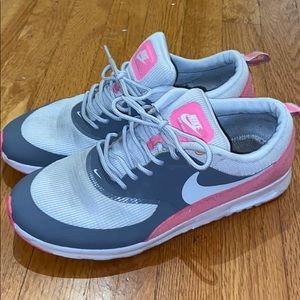 Gray/ pink sneakers.